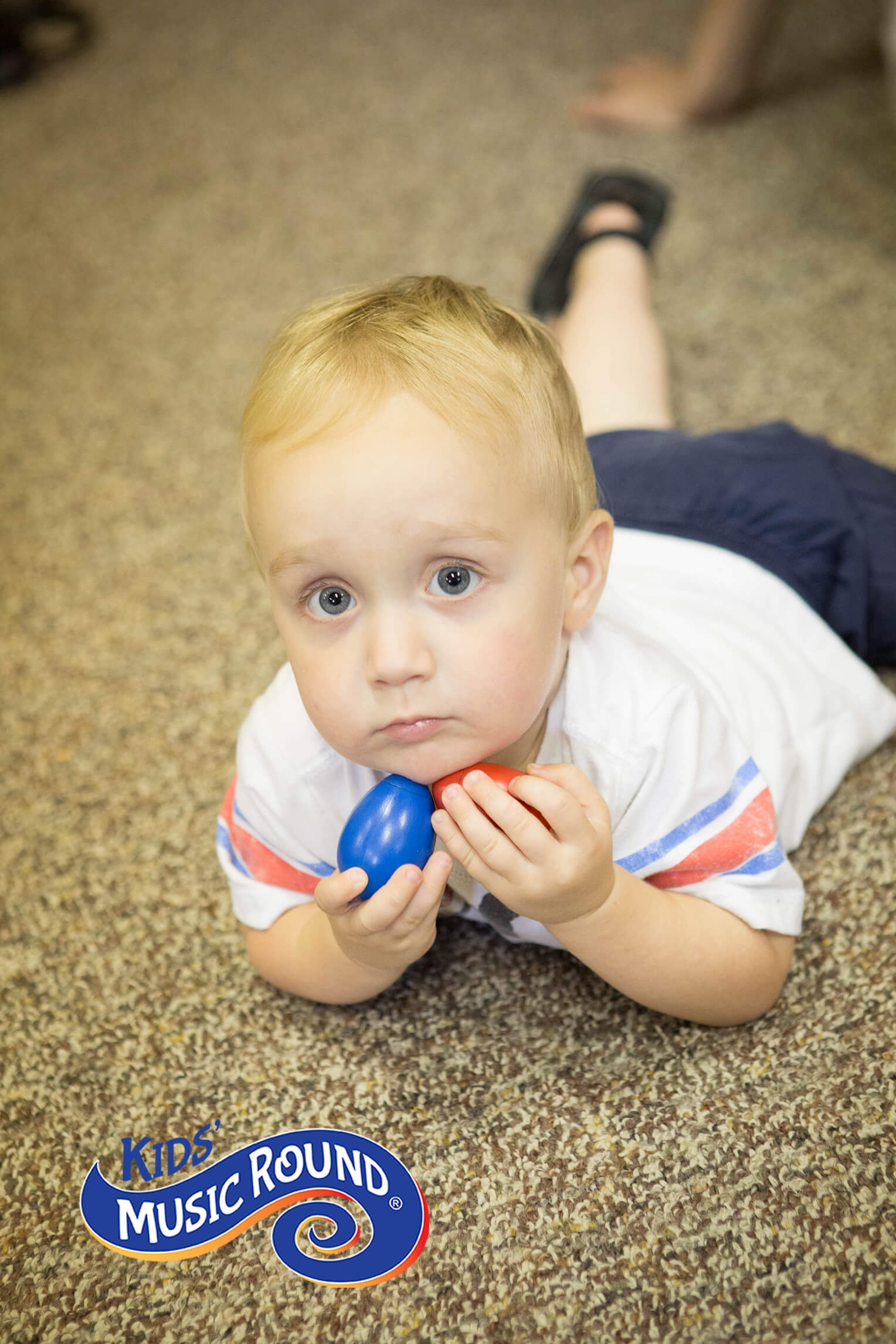 Child exploring egg shakers