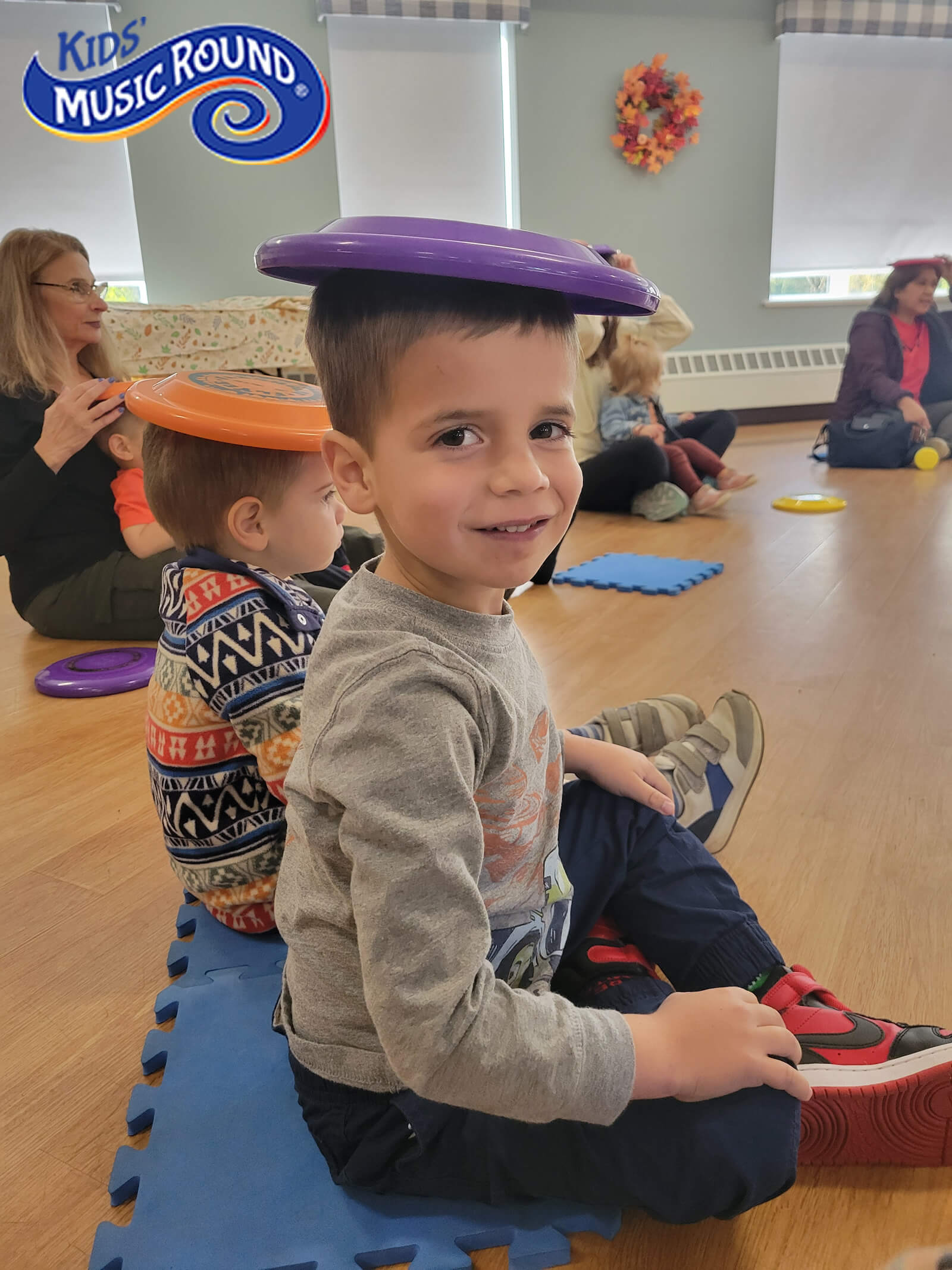 Children enjoying silly musical instruments