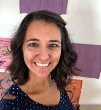 Kim Zenyuch smiling at the camera